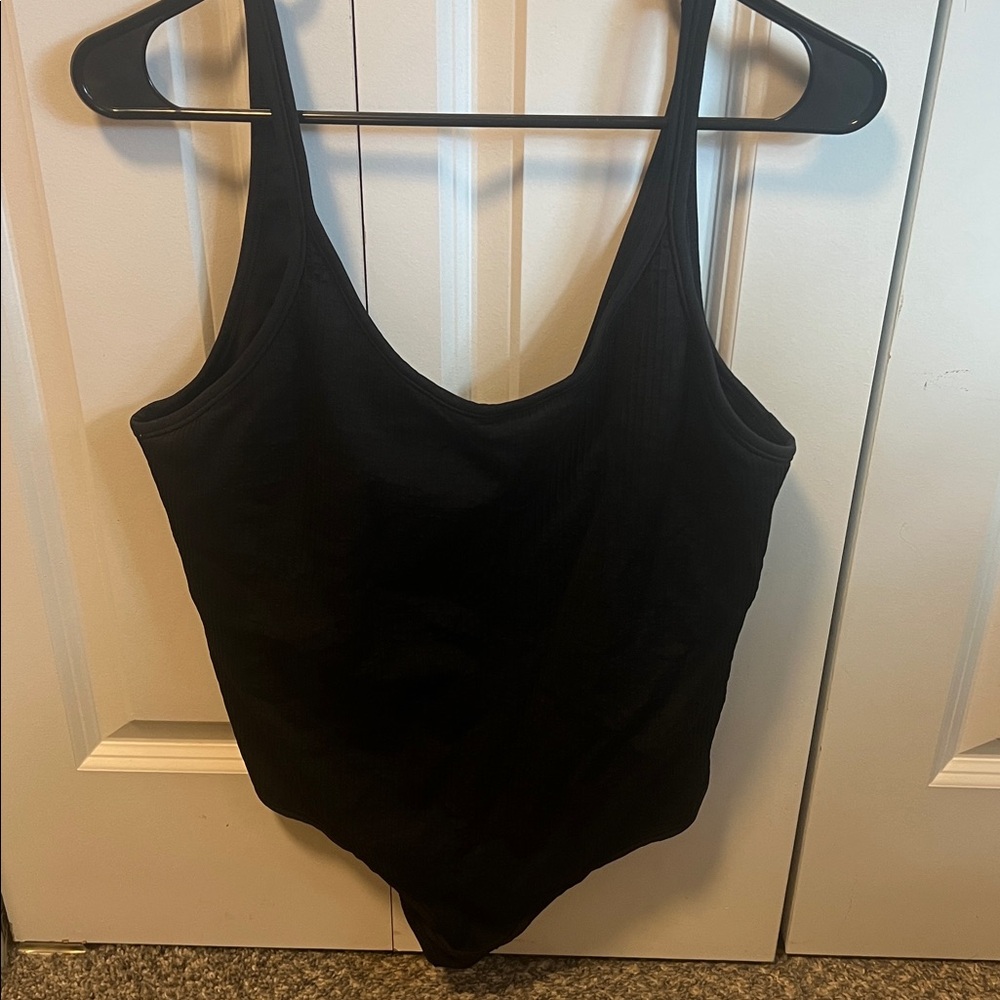 Lululemon Athletica Ebb to Street Bodysuit